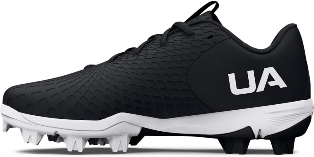 Woman wearing Under Armour baseball shoes on a softball field